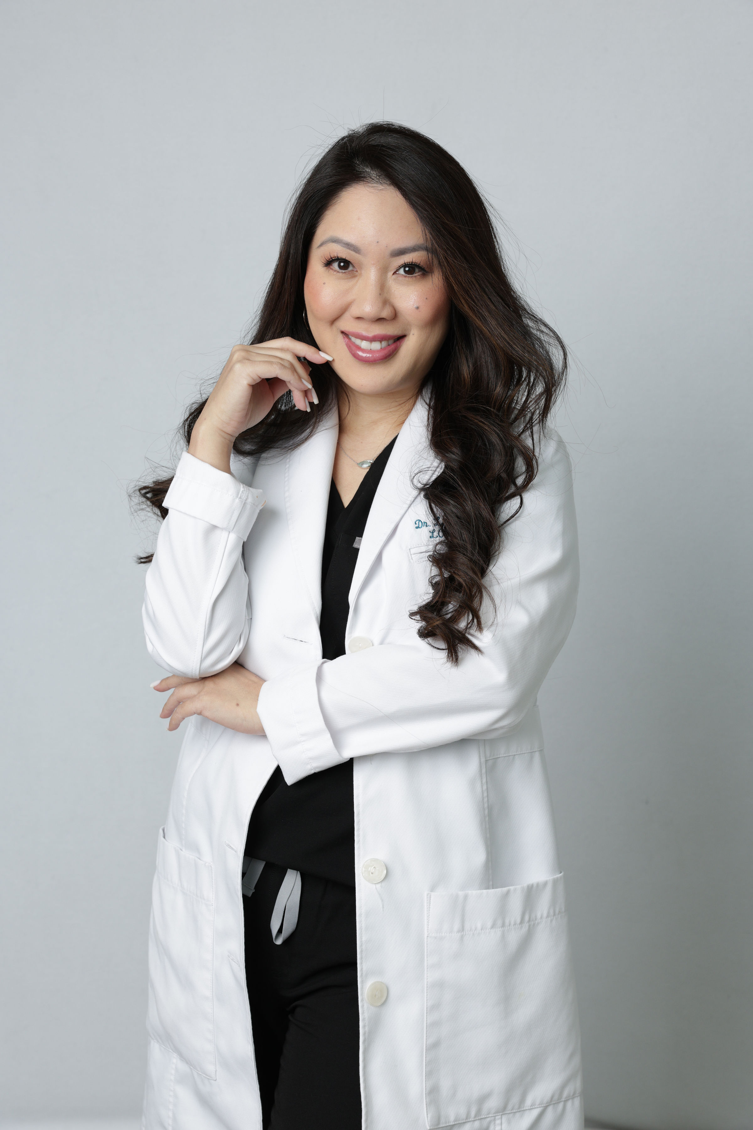 Dr. Lanna Cheuck reviewing peptide sourcing documentation